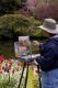 Susi in Butchart Gardens painting near pond in