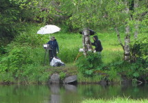 Susi & Alice painting in the rain by Karen Cornelius